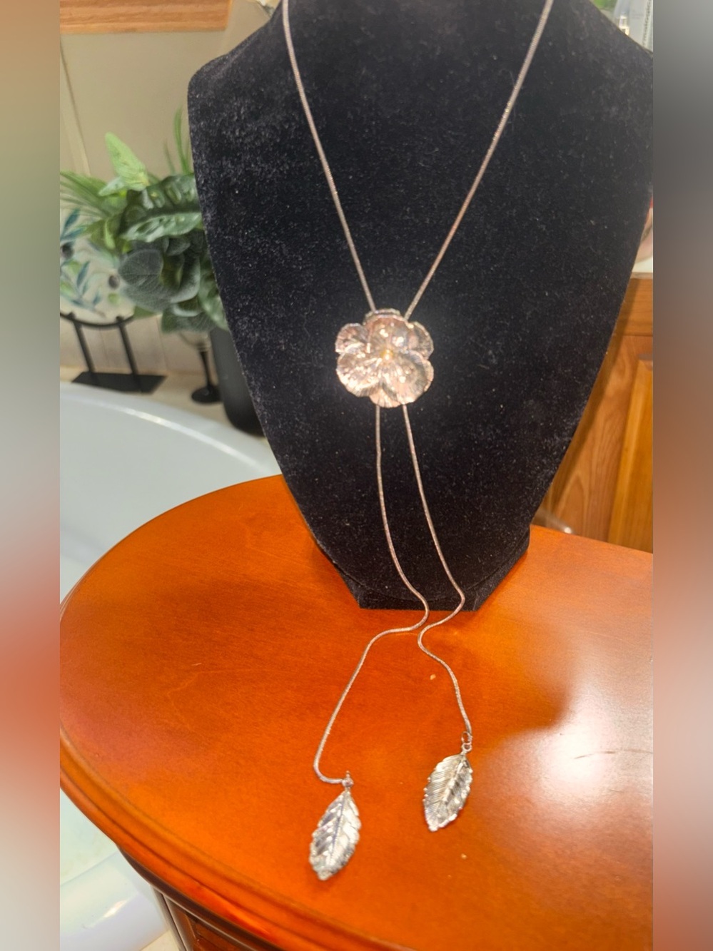 Silver Floral Lariat Necklace with Leaf Drops